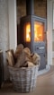 brown wooden fire place in front of white wooden door