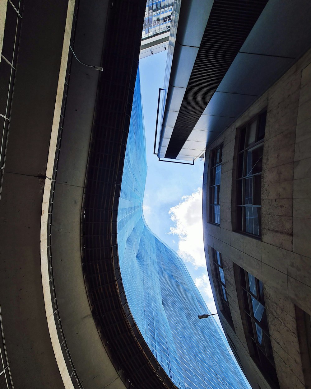 brown concrete building under blue sky during daytime