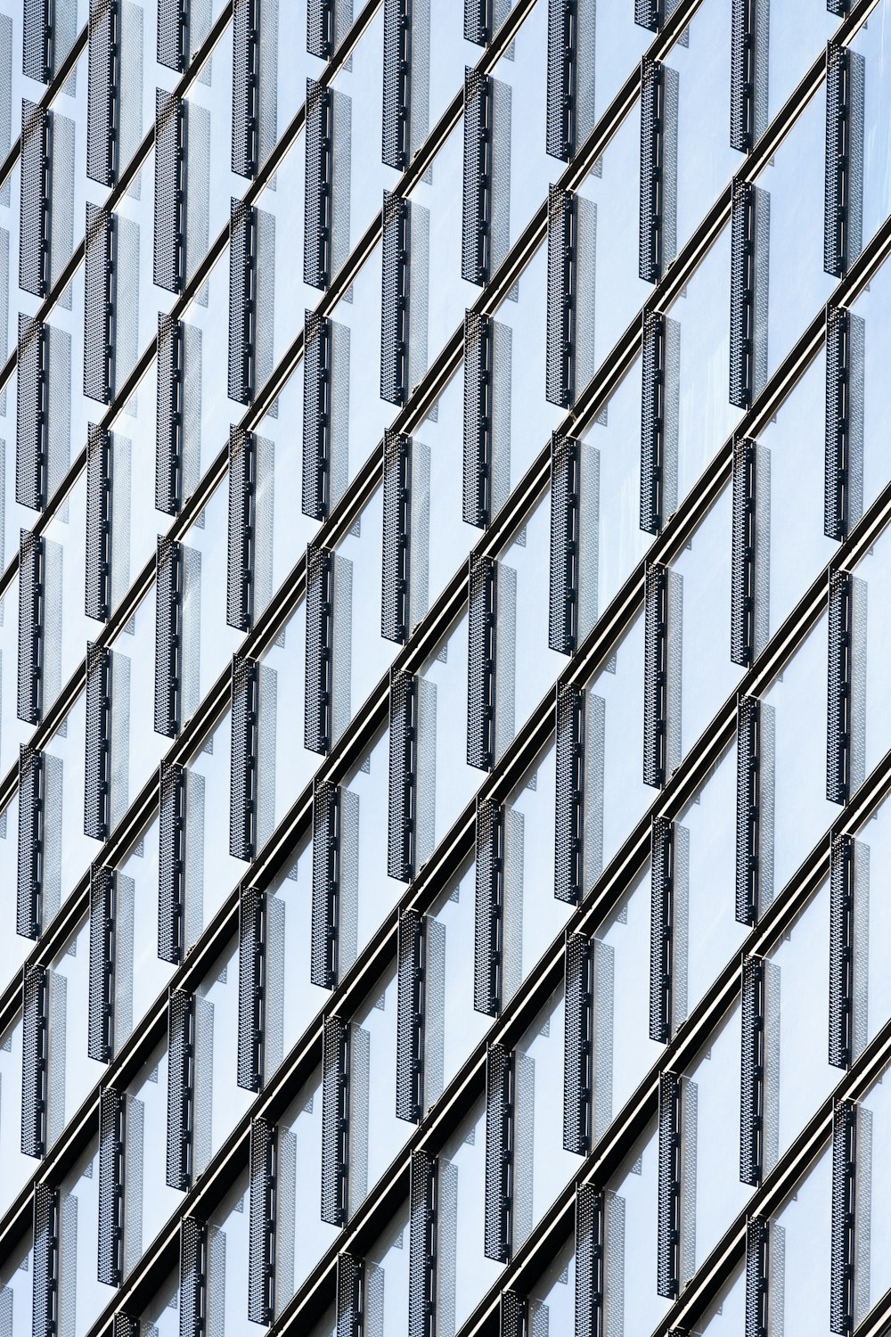 grey metal fence during daytime