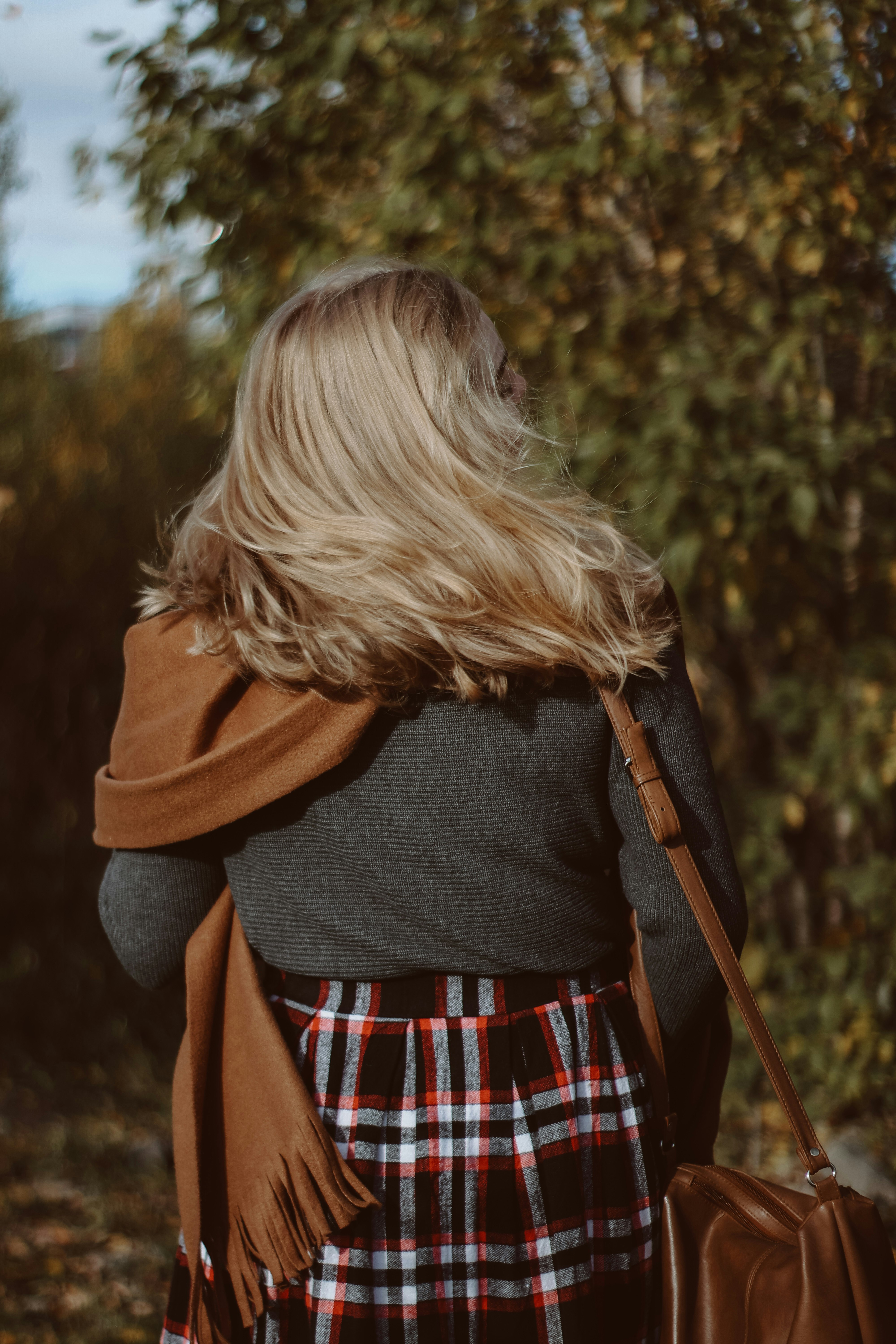 woman in red and black plaid dress shirt