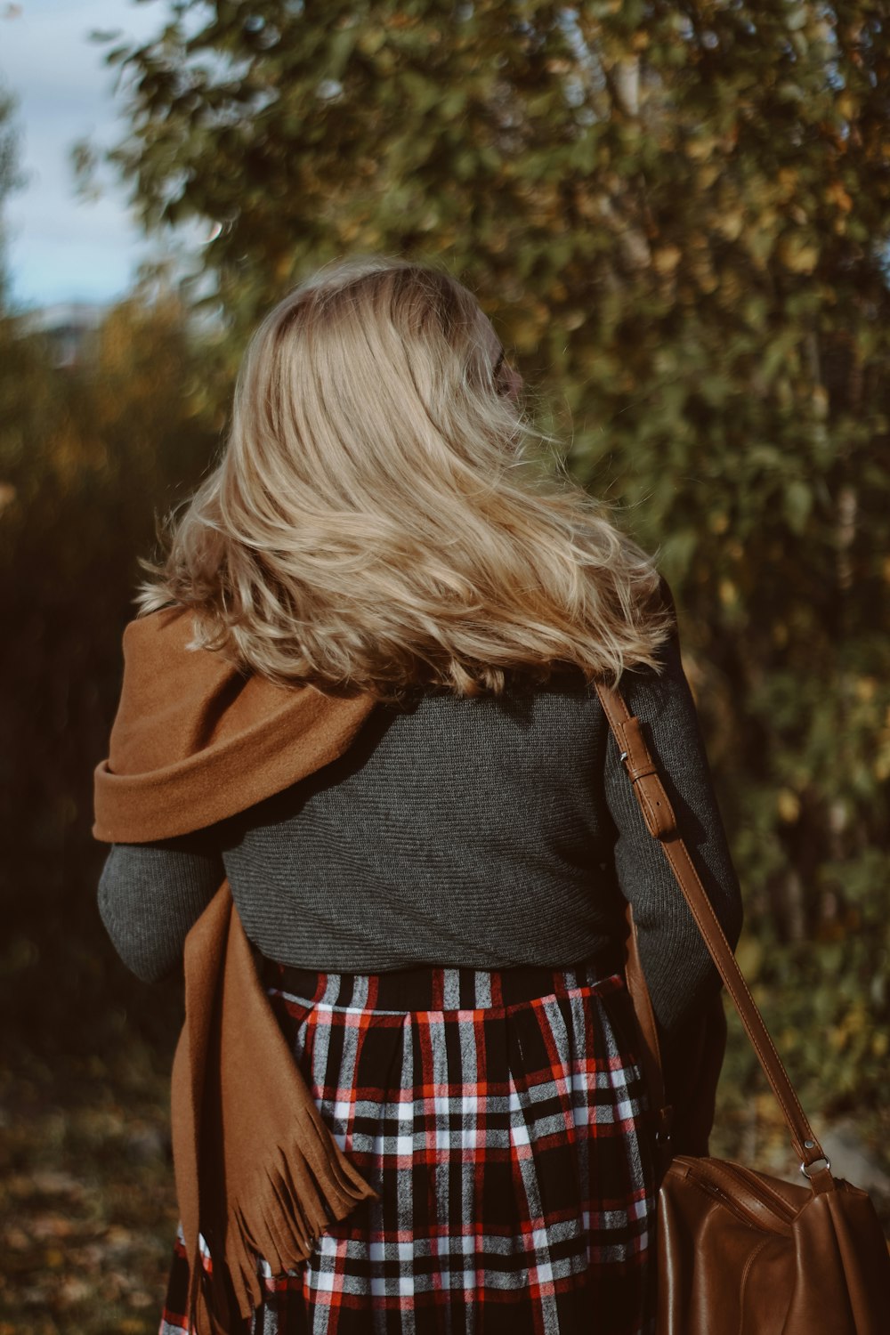 woman in red and black plaid dress shirt