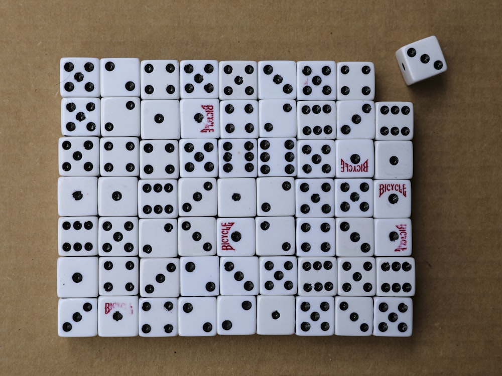 white and black calendar on brown wooden table