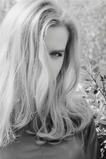 grayscale photo of womans face