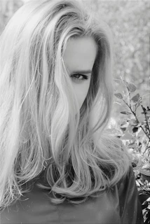 grayscale photo of womans face