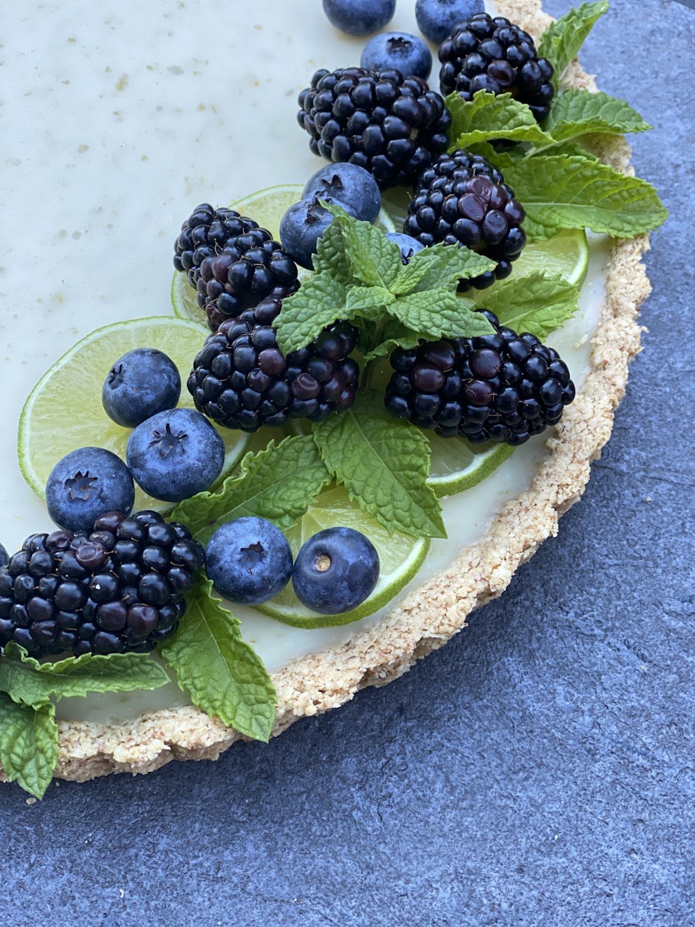 black berries on green leaf