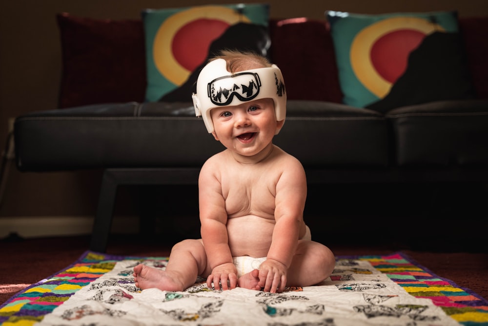 baby wearing white and red headband