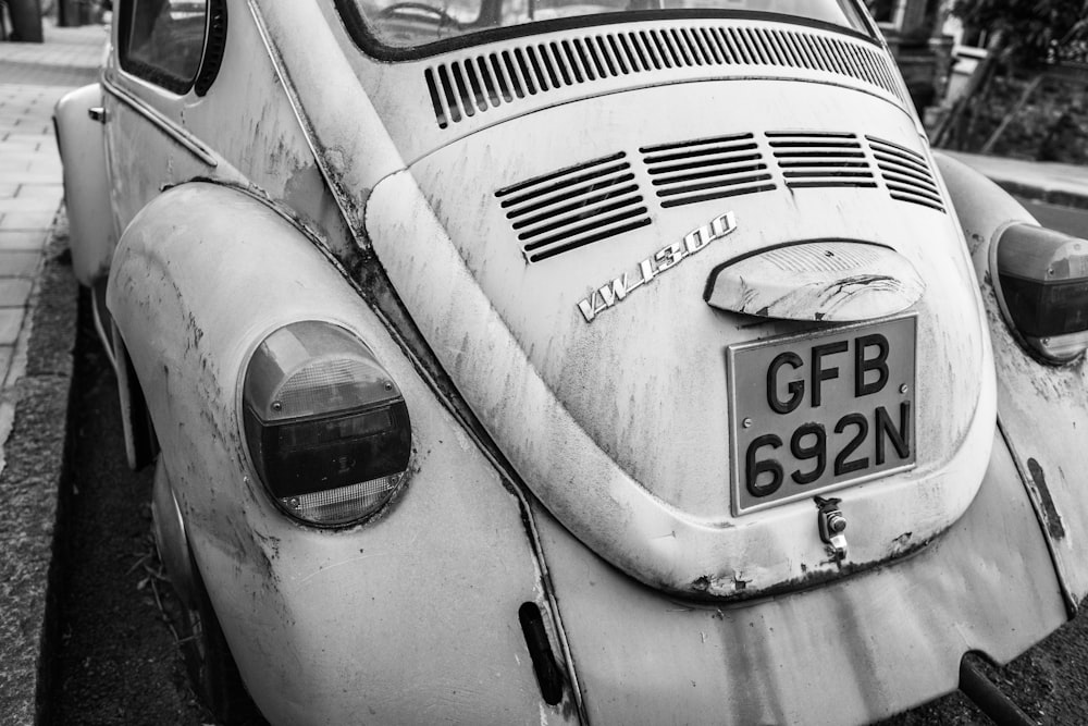 grayscale photo of volkswagen beetle