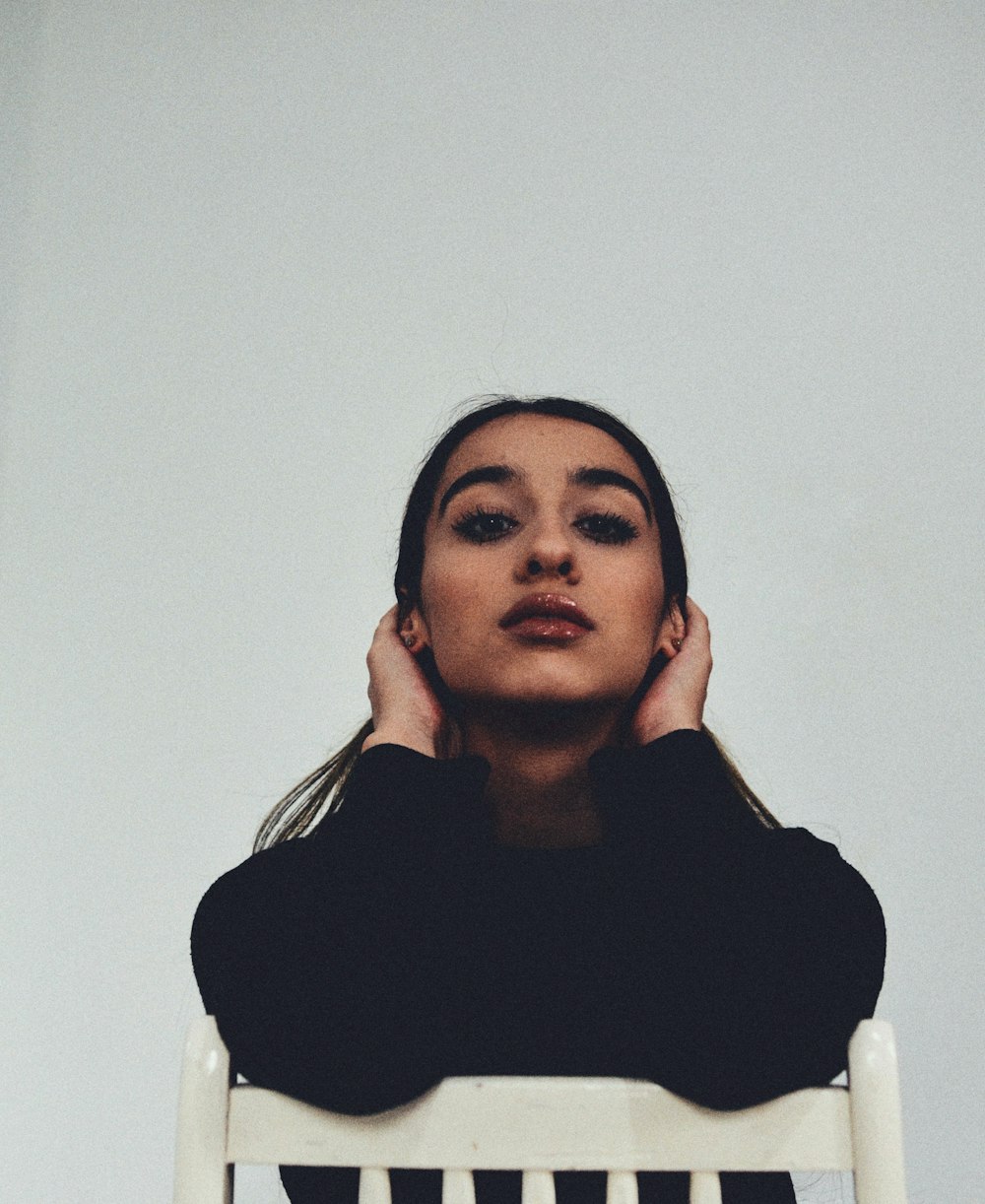 woman in black and white long sleeve shirt