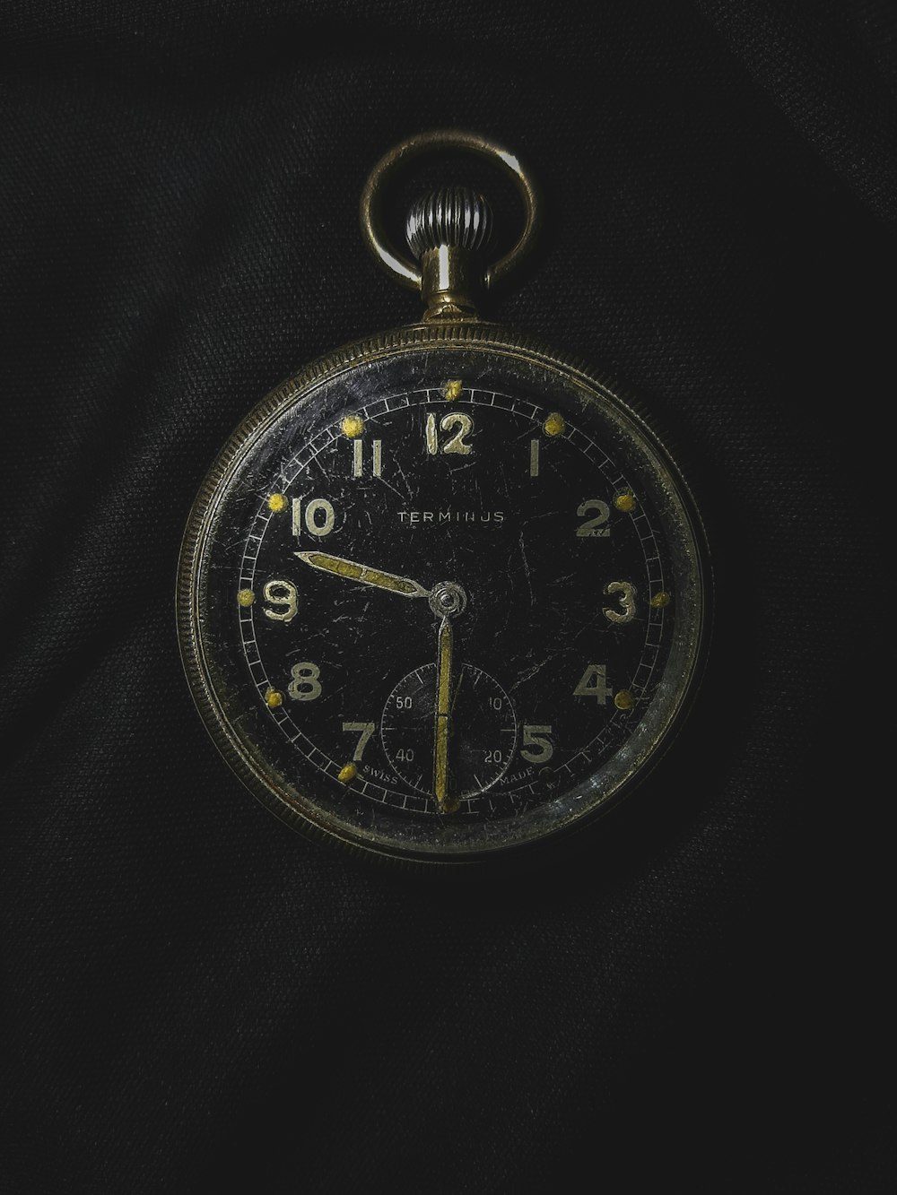 silver and black round chronograph watch