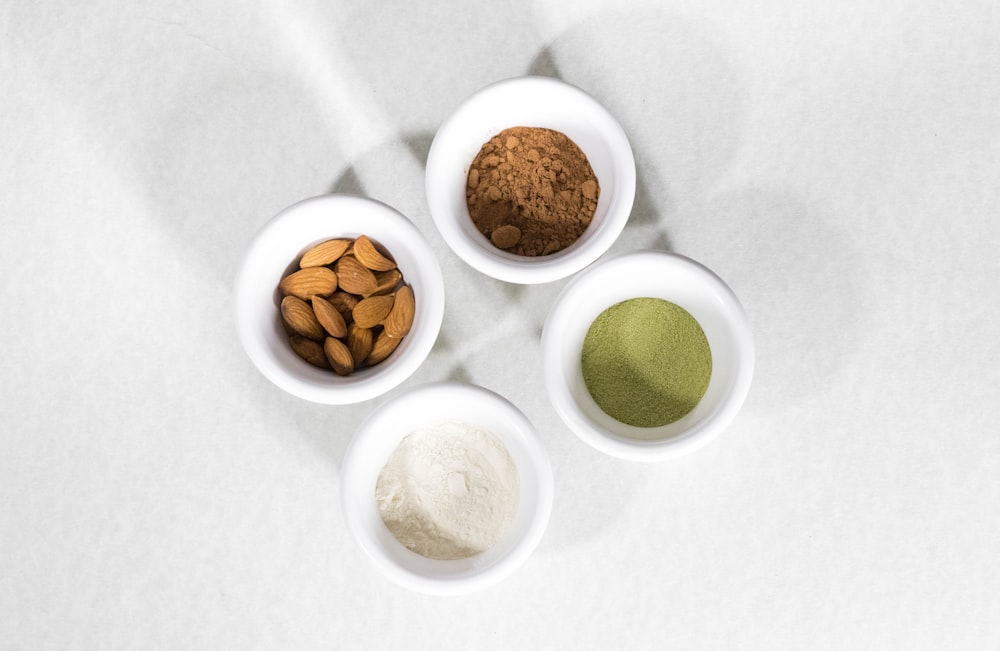 brown and white round food on white ceramic bowls