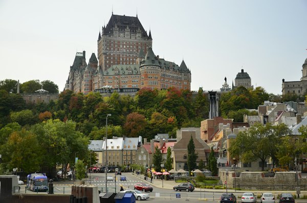 Cars parked near brown and gray concrete building during daytime — Quebec City, Canada