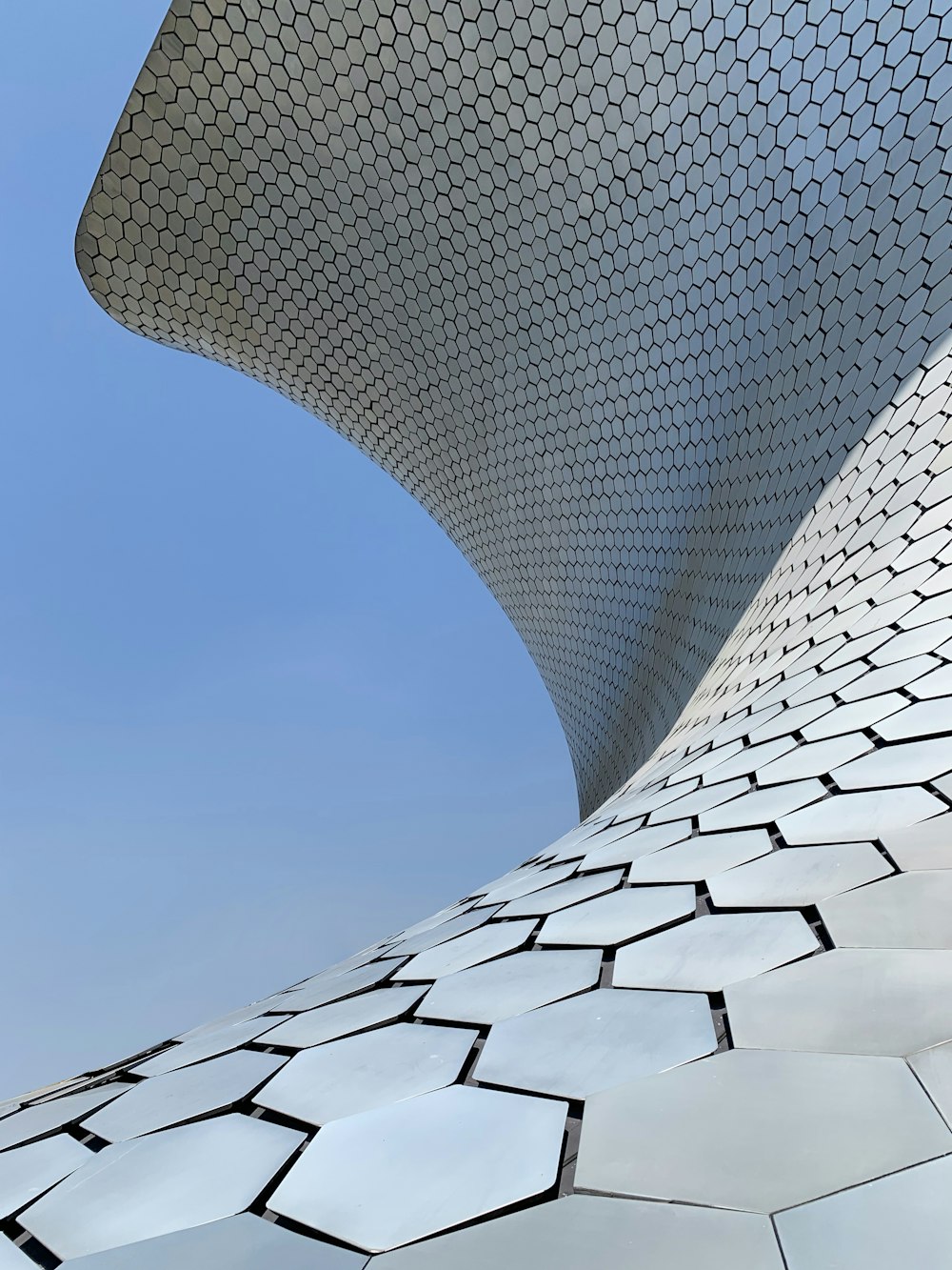 gray concrete building under blue sky during daytime