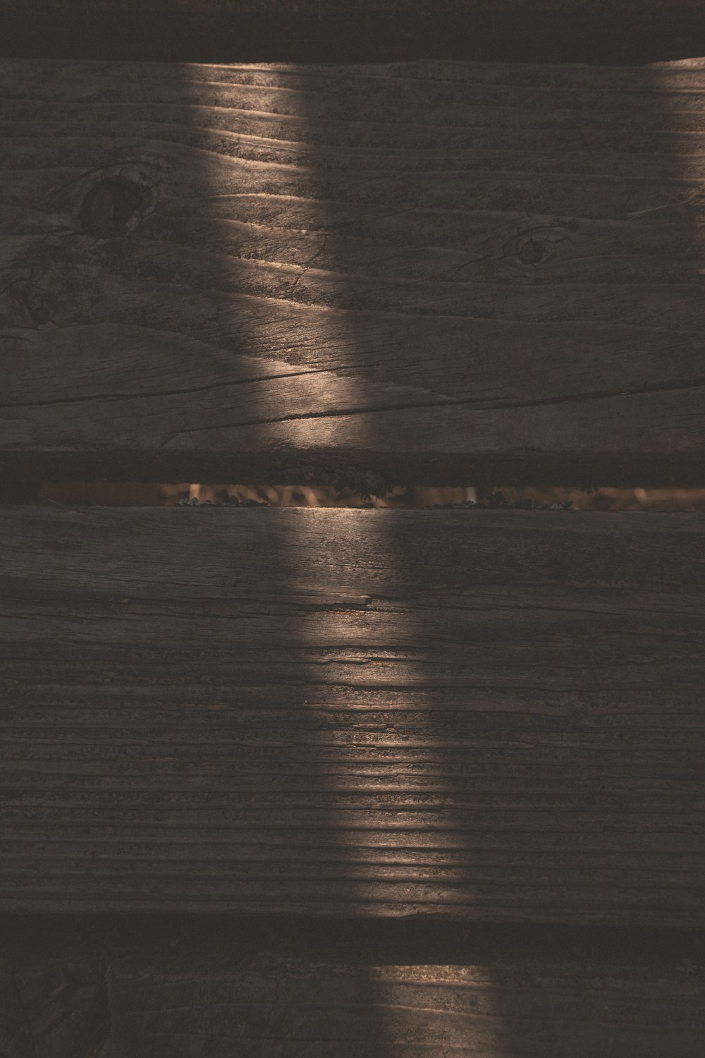 brown wooden surface with light reflection