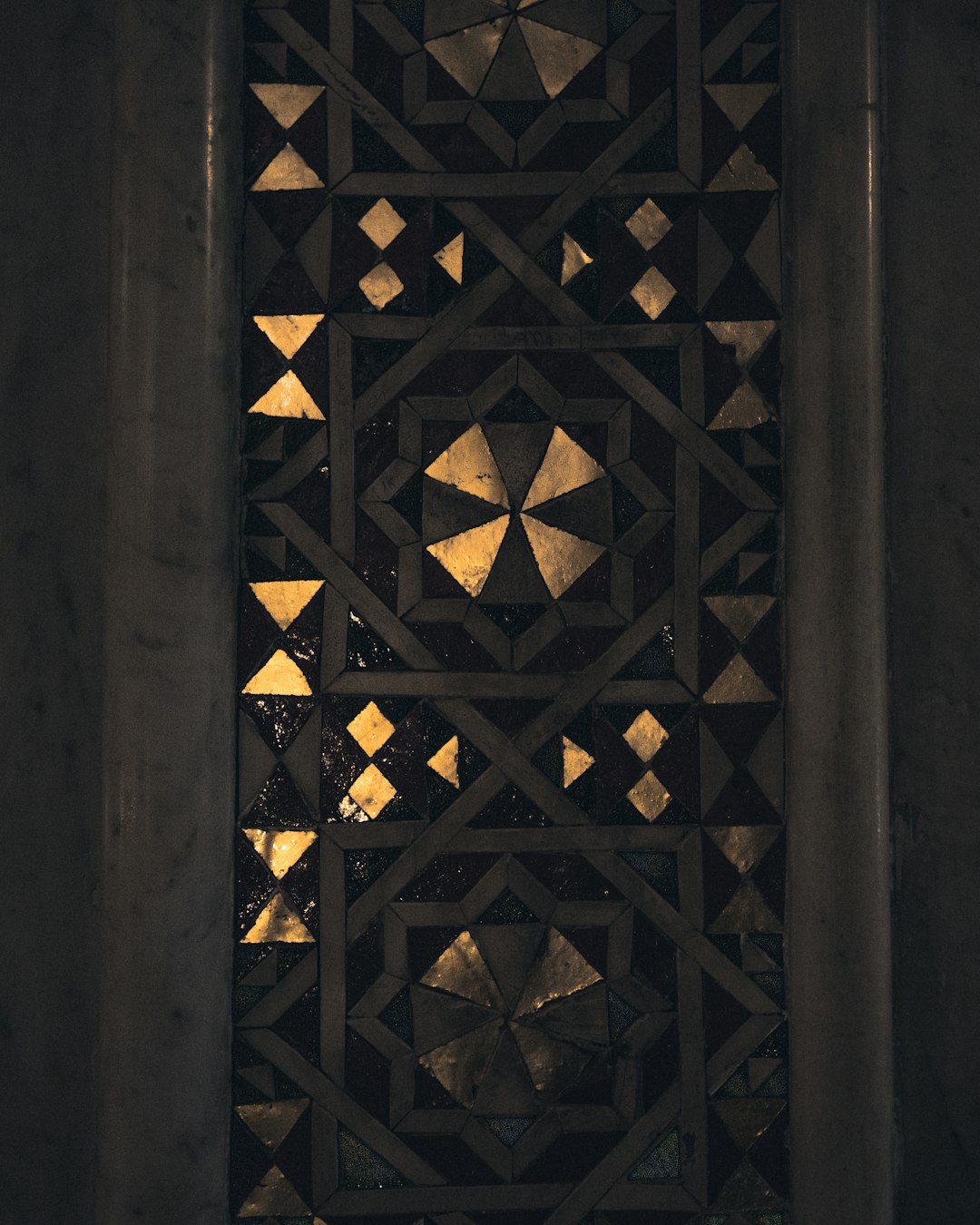 brown wooden door with gold door lever