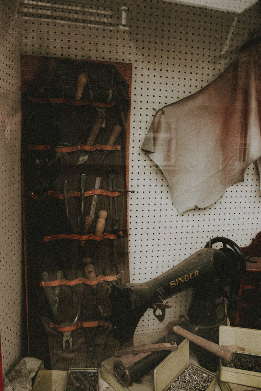 black sewing machine beside white textile