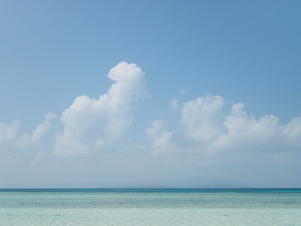 white clouds over blue sea during daytime