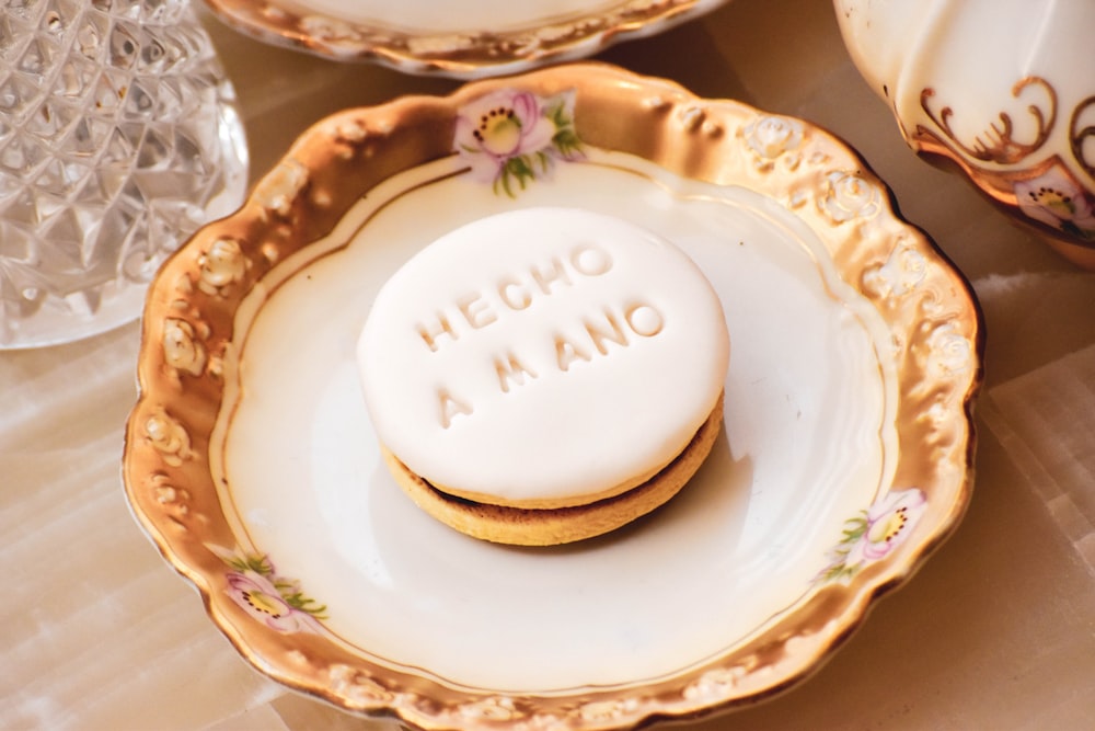 white and brown ceramic round plate