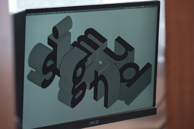 black dell flat screen computer monitor