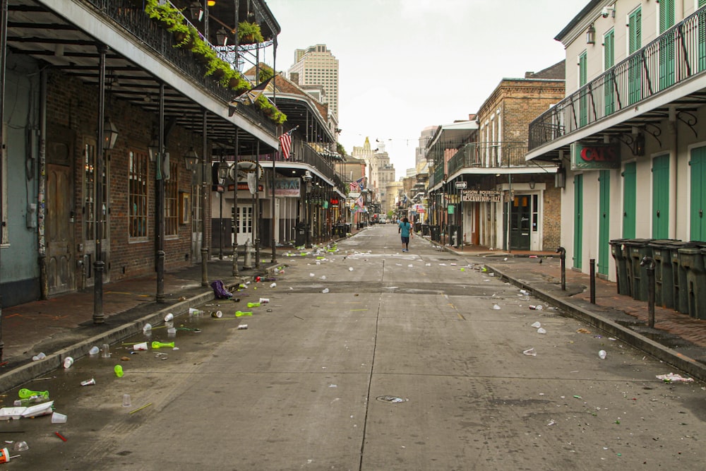 people walking on sidewalk near buildings during daytime