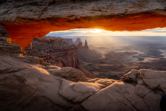 A warm sunset view over the winding walls of Antelope Canyon.