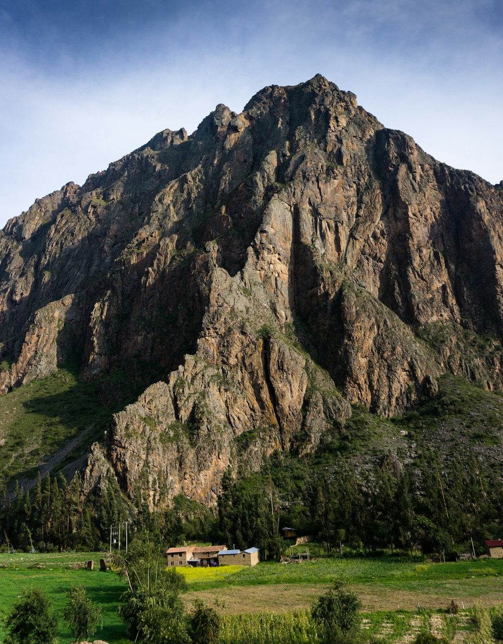 green and brown mountain under blue sky during daytime