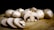 A close-up of various types of fresh mushrooms arranged on a wooden cutting board.