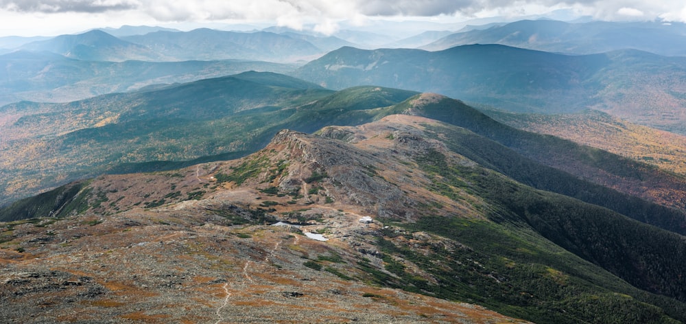 a view of a mountain range from the top of a mountain