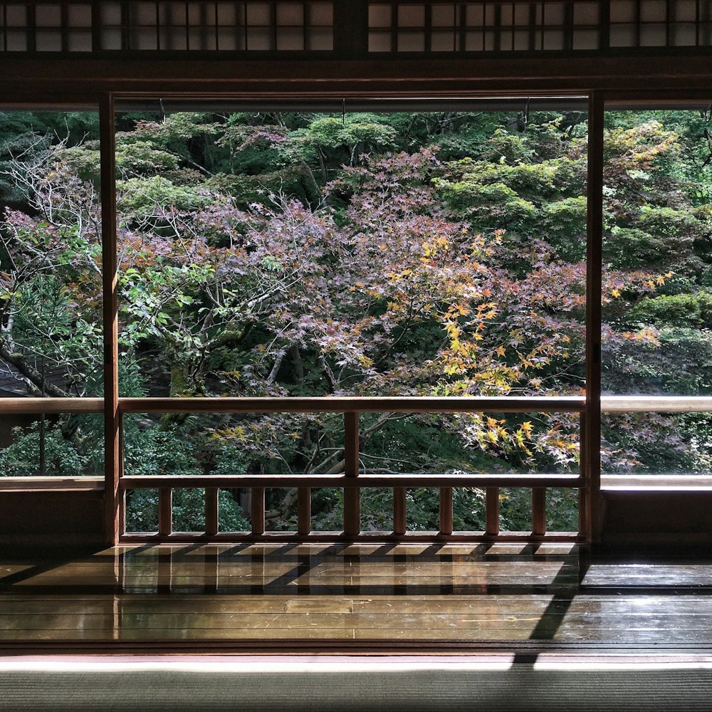 brown wooden framed glass window