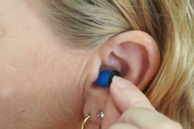 A close-up of intelligent ear plugs designed for sound management.