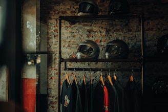 black helmet on black steel rack