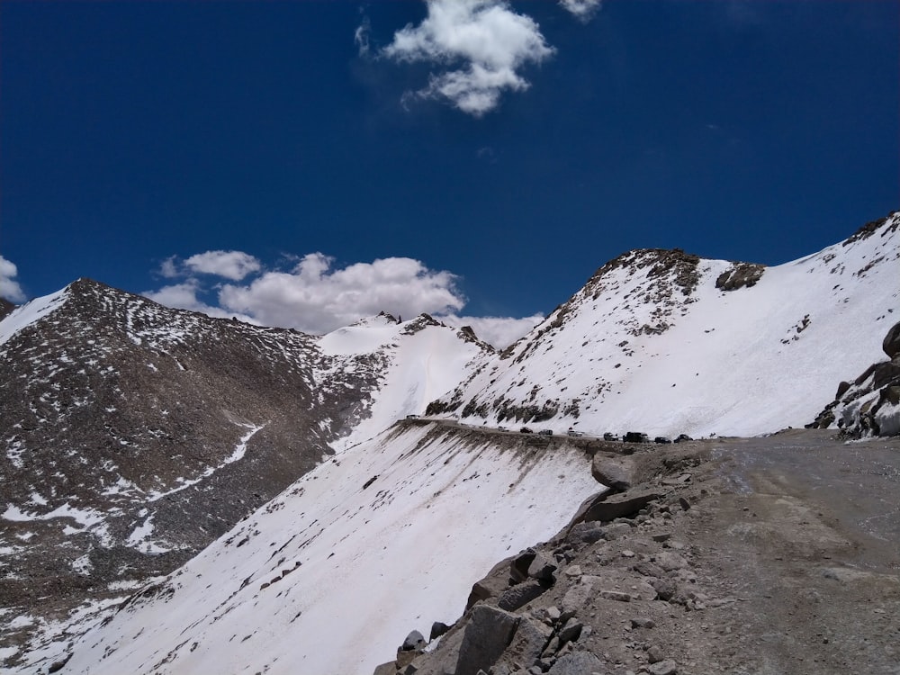 snow covered mountain under blue sky during daytime