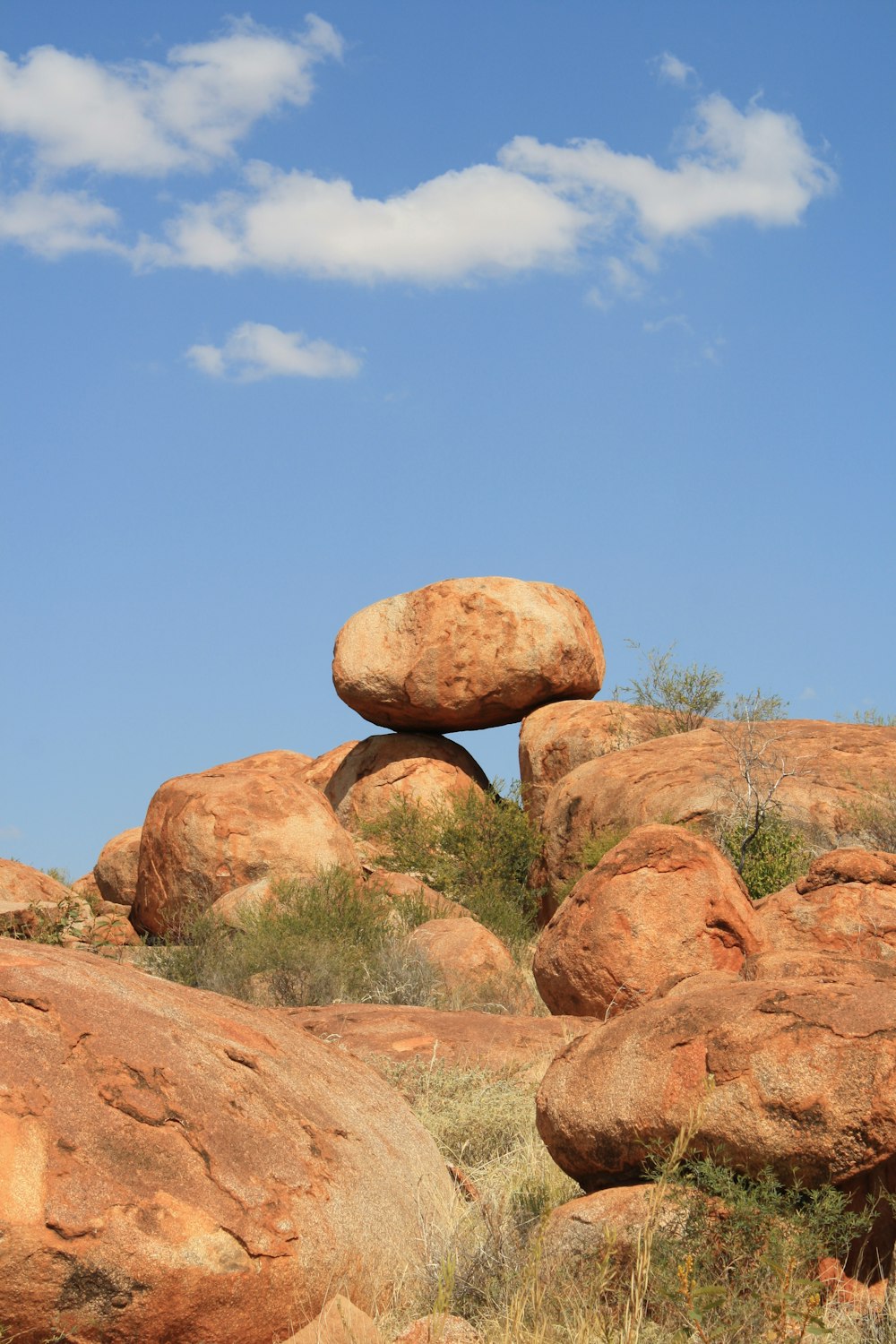 brown rock formation under blue sky during daytime