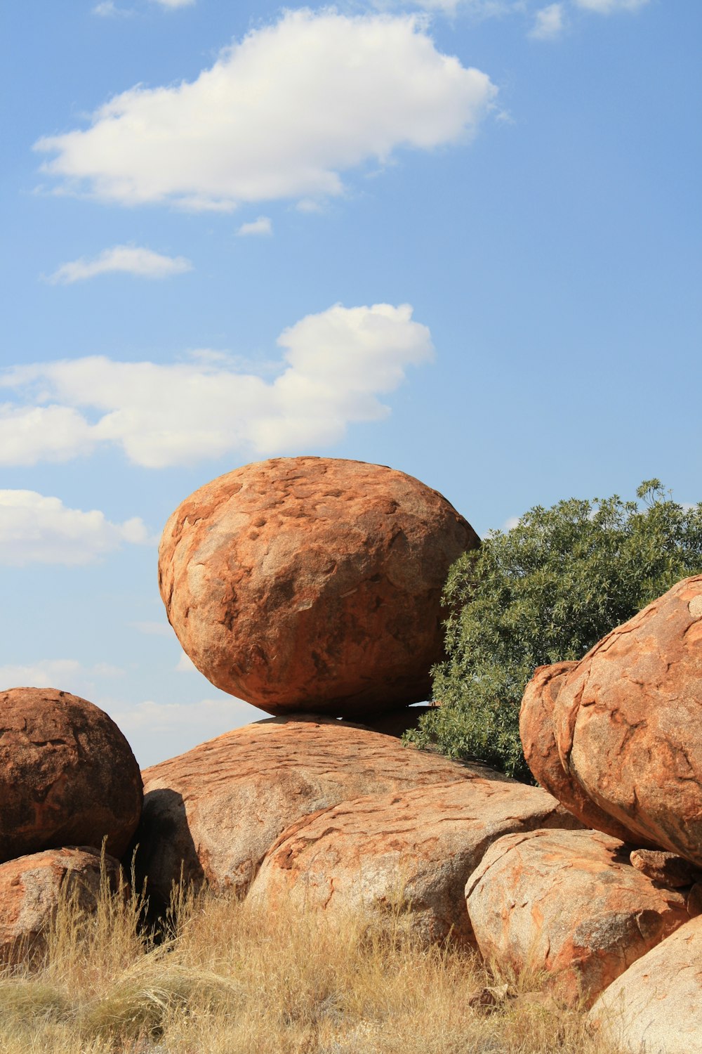 brown rock formation under blue sky during daytime