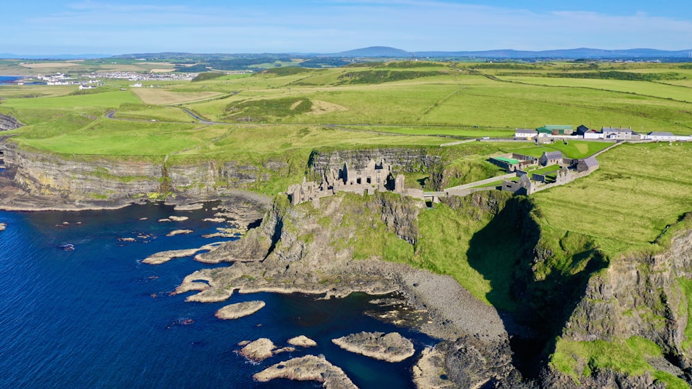 an aerial view of the cliffs of the irish coast