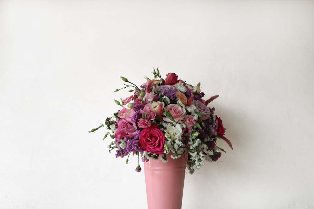 pink roses in pink vase
