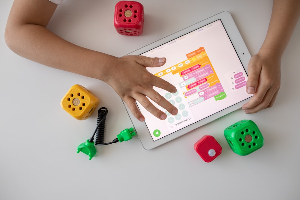 Extracurricular Activities for Kids - Kid Coding in a Tablet