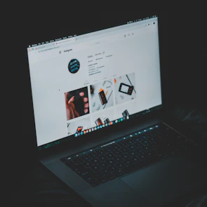 A laptop screen showing a successful Instagram campaign dashboard.