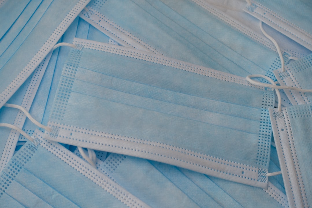 white and blue striped textile,