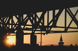 A wide shot of a newly constructed San Antonio bridge at sunset.