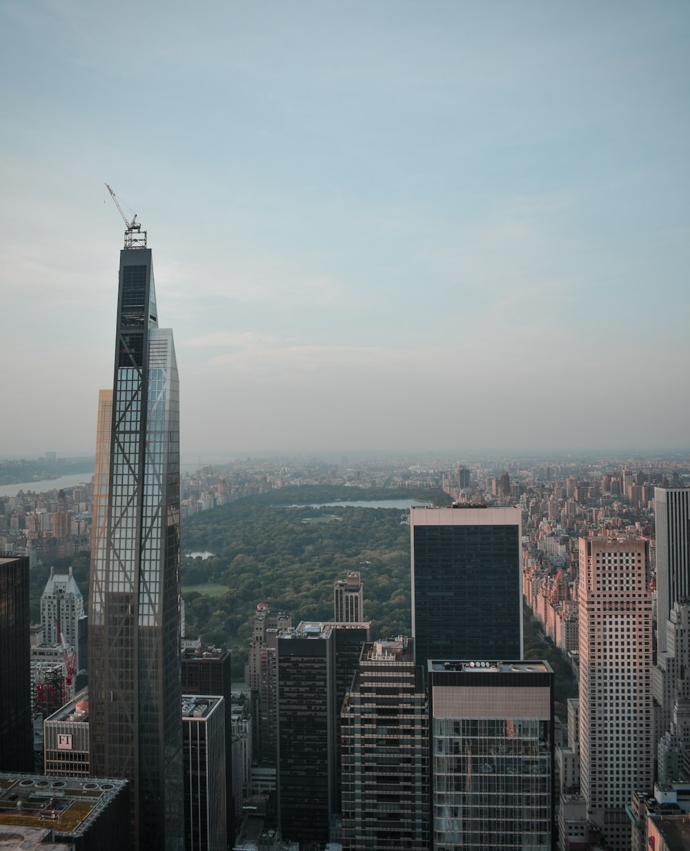 high rise buildings under gray sky during daytime