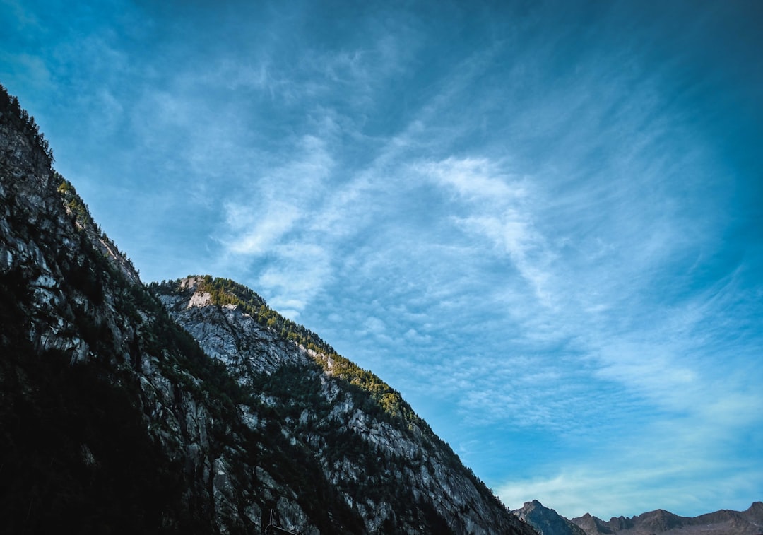 green and black mountain under blue sky during daytime