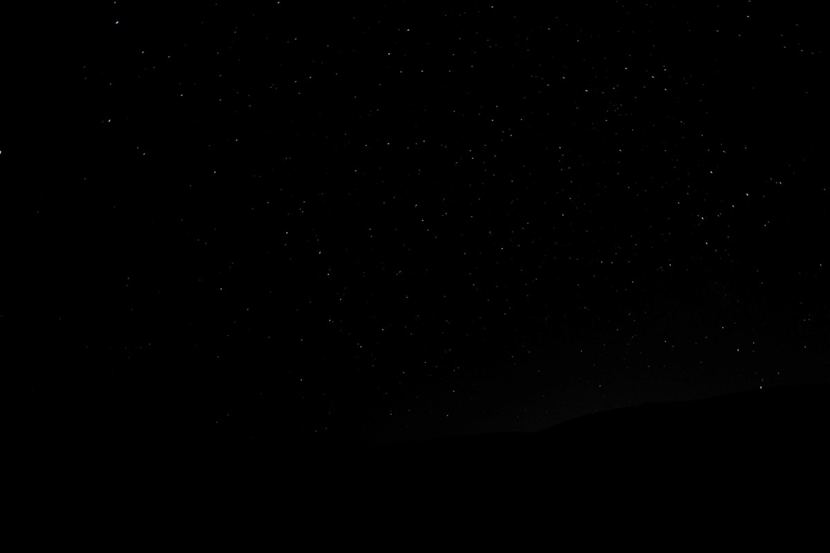 Large wall photo frame hanging perfectly above a modern sofa in a well-decorated Indian living room