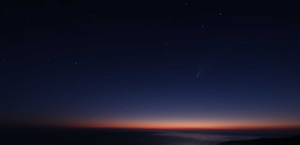 blue sky with stars during night time