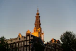 Historic architecture of Bucharest bathed in warm sunset light, showcasing intricate details