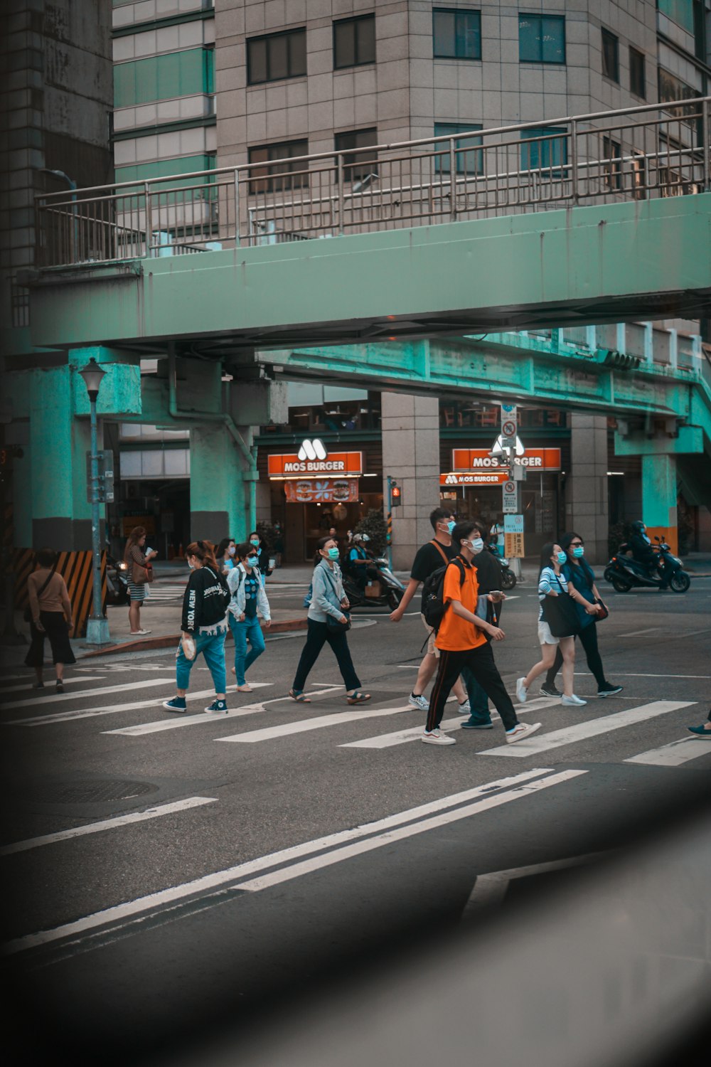 people walking on pedestrian lane during daytime