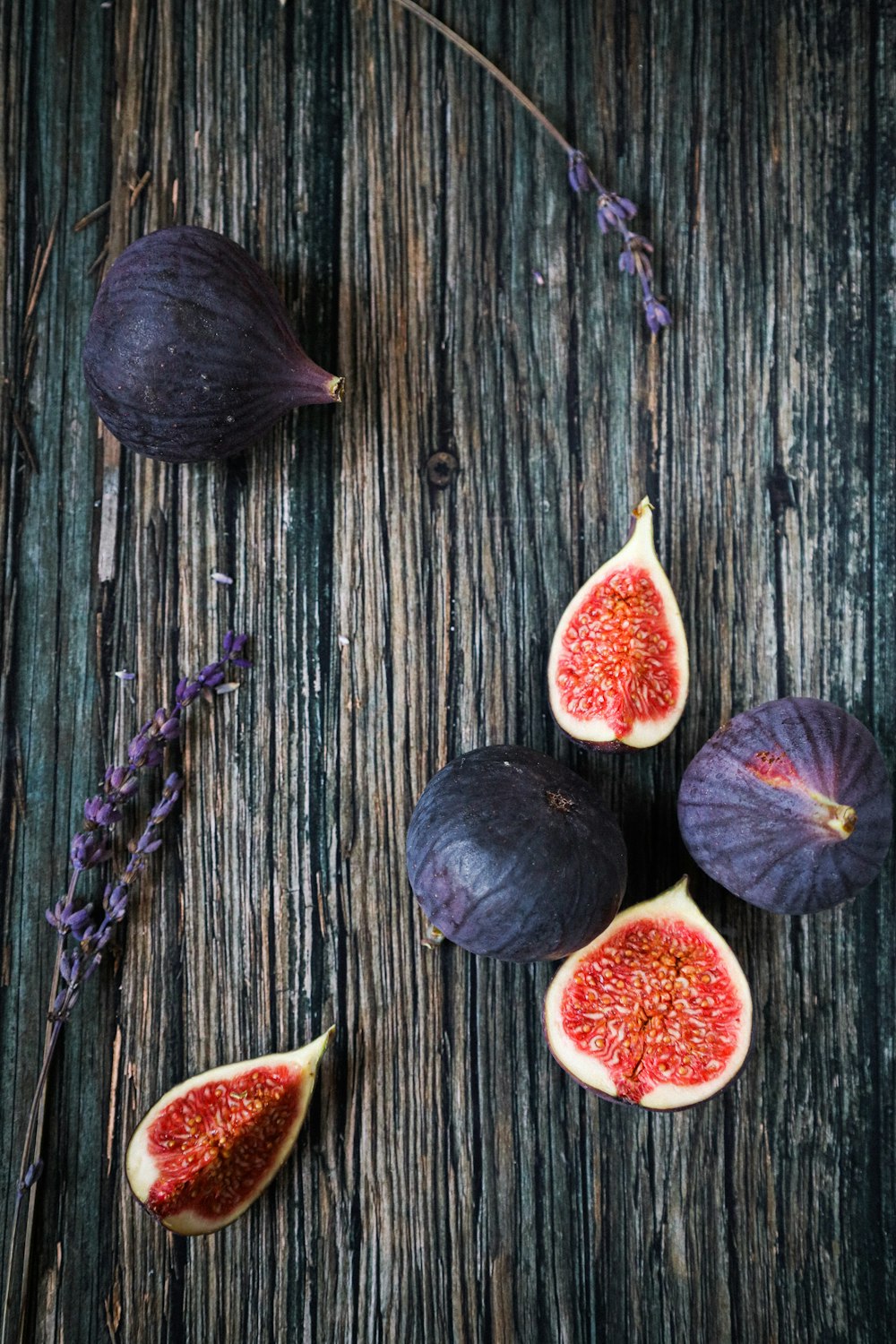 black round fruit on black wooden table