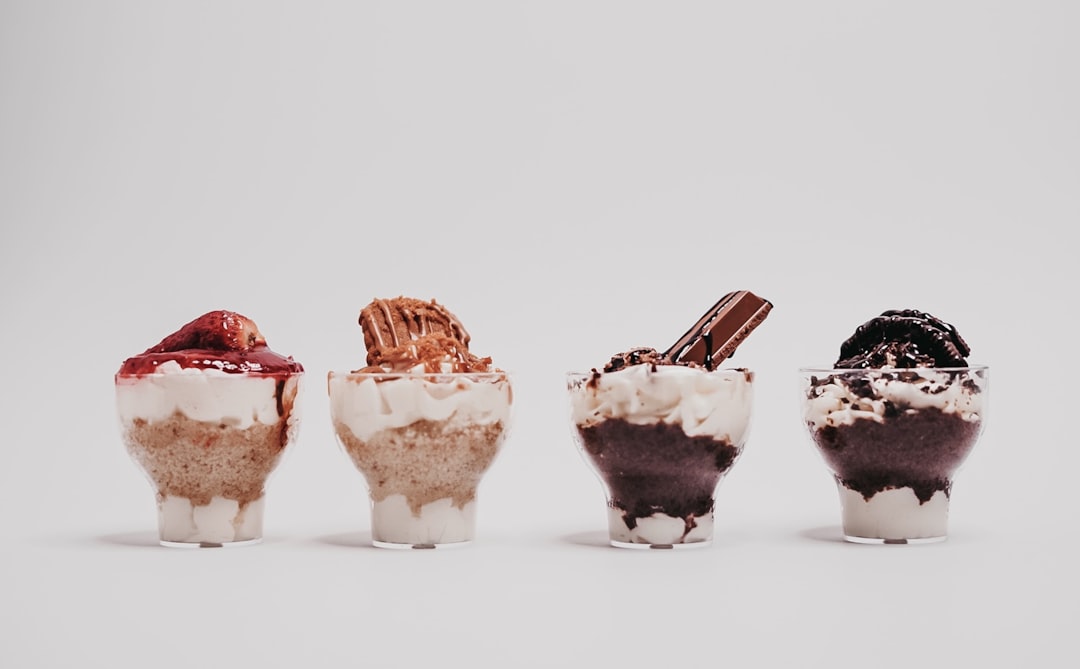 three cupcakes with white cream on top, Sweet