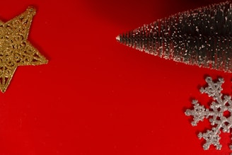 A vibrant Christmas scene with snowflakes and ornaments framing a portrait.