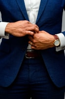 man in blue suit jacket and white dress shirt