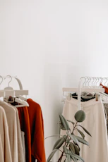 clothing racks with neutral toned garments